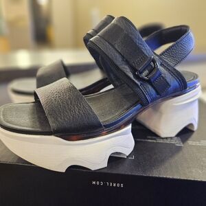 Sorel Kinetic Impact Slingback Black and White Platform Sandals